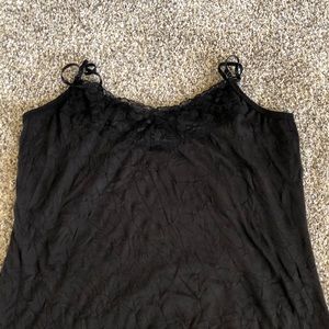 Maurice’s Black crinkle tank.